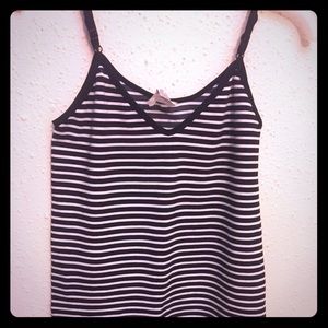 Adjustable spaghetti stripe strap shirt.